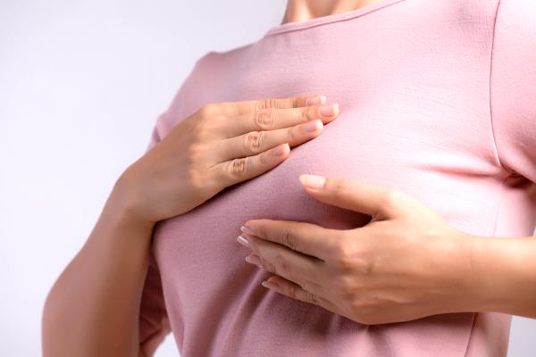 woman-checking-breast-cancer